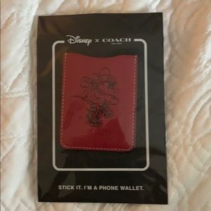 Brand new Disney/Coach collaboration phone wallet